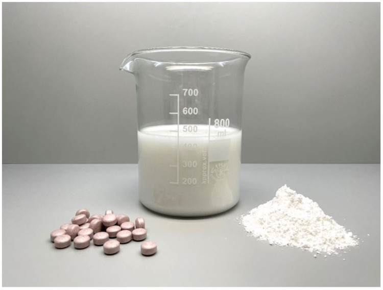 Sodium alginate as an alternative to shellac as enteric film coating for solid oral dosage forms
